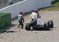 Jacques Villeneuve walks away from his crashed F1.06 in his final F1 race. Villeneuve Germany2006.jpg