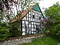 1-sch.  Half-timbered house + Kotten