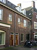 Bedrijfspand met bovenwoning Winkelwoonhuis