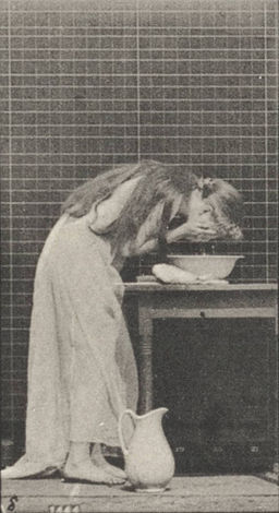 Woman brushing hair and washing face (rbm-QP301M8-1887-496a~8)