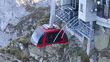 Newest aerial cable car (called Dragon Ride) arriving at top station of Pilatus