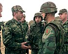 Maj. Gen. Valery Yevtukhovich (left), commander of the Russian forces in Kosovo, greets Brig. Gen. John Craddock (second from right)