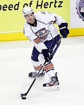 Schultz with the Oklahoma City Barons in 2012. AHL Hockey Oct 23 Barons vs Monsters (50482415002).jpg