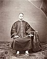 A Cantonese man dressed for Chinese New Year, Canton, 1861-1864 (Vintage.es).jpg