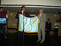 Anton Sirota receiving IChO Flag.jpg