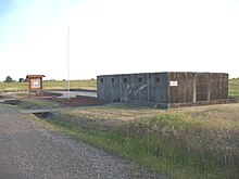 The remnants of a World War II German POW camp at Beale AFB. This cell block was used for isolation detention. BealeAirForceBasePOWCellBlock.JPG