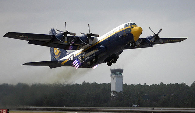 Blue Angels' Marine Corps Lockheed C-130 Hercules "Fat Albert" conducting a RATO (rocket-assisted takeoff)