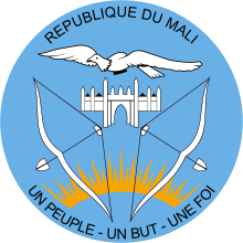 los gabinetes de Mali: en un círculo con un fondo azul hay una mezquita, sobrevolada por un buitre, y custodiada por dos arcos de flechas debajo del sol naciente alrededor del cual podemos leer República de Mali y la moneda de Mali