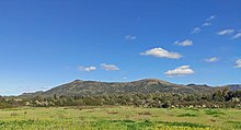 I rilievi al confine col territorio comunale di Carbonia comprendono anche il monte San Giovanni, il punto più alto del comune