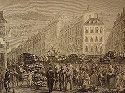 Construction d'une barricade au faubourg Saint-Antoine en 1871