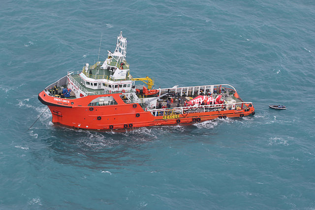 An offshore supply ship with the tail of PK-AXC on its stern on 10 January 2015