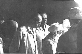 Kenessey (center, back) at work as surgeon