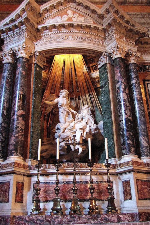 Bernini's Ecstasy of Saint Theresa in the Cornaro family chapel in the church of Santa Maria della Vittoria, Rome.