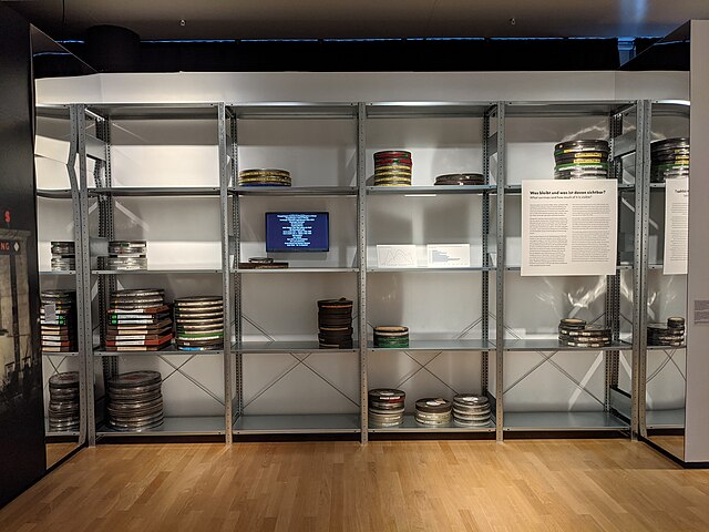 Simulation of a film archive: the shelves have been left almost empty to help visitors better visualize the gap between the number of surviving films 