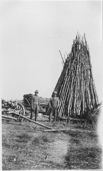 File:Fuel stored for winter at the Fort Hall Reservation. It is stored this way to keep it out of the snow and to keep it... - NARA - 298562.tif