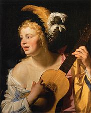 Γυναίκα παίζει κιθάρα
