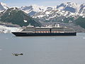 Holland America Line's MS Oosterdam passing Turner Glacier while leaving Disenchantment Bay