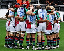 Harlequins in a huddle during the 2008-09 season. Harlequins huddle.jpg