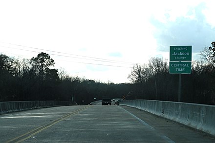 The sign for Jackson County on U.S. Route 90.
