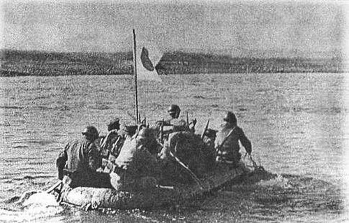 Japanese soldiers cross the Khalkhin Gol