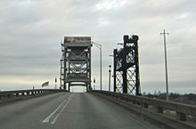 Judge Perez Bridge and adjacent railroad bridge, viewed from car on Belle Chasse Hwy.jpg