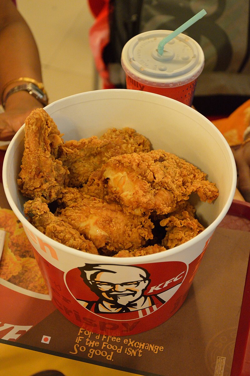 https://upload.wikimedia.org/wikipedia/commons/thumb/3/3e/KFC_-_Pressure-fried_Chicken_-_Howrah_2014-03-23_9718.JPG/800px-KFC_-_Pressure-fried_Chicken_-_Howrah_2014-03-23_9718.JPG