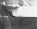U.S. escort carrier Gambier Bay is straddle by Japanese heavy cruiser gunfire during the Battle off Samar.
