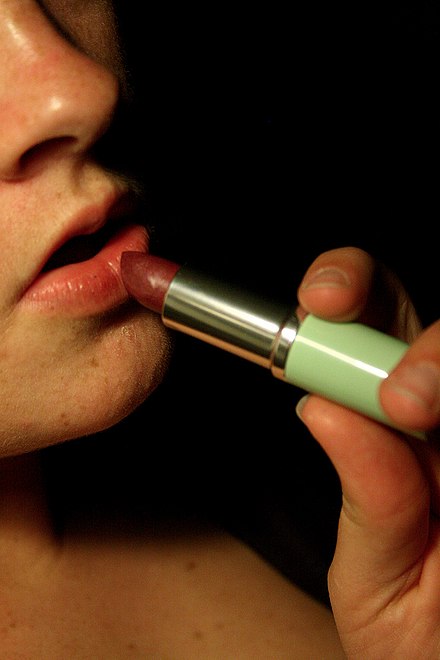 Lipstick in plastic disperser package