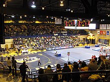 The layout of a collegiate wrestling dual meet taking place alongside a collegiate gymnastics meet MAC Center dual.JPG