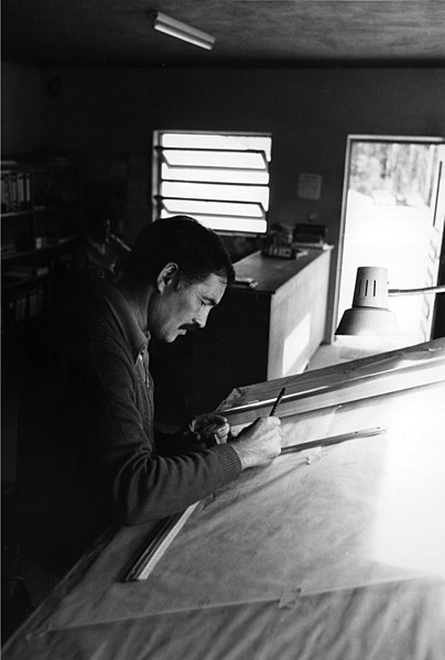 A drafter in Portugal in the 1970s, using a drafting machine