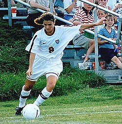 Mia Hamm takes a corner kick, 1995