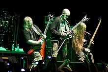 Nile performing at Santana Hall in 2010. From left to right: Karl Sanders, Dallas Toler-Wade and Chris Lollis. Nile in performance (Sao Paulo, 2010).jpg