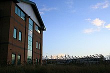 Office building on Pride Park, with Pride Park Stadium in the background Office Building and Pride Park Stadium - geograph.org.uk - 1058487.jpg