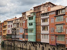 Castres is best known in French political history as the birthplace of Socialist leader Jean Jaures. Old houses by the Agout River in Castres.jpg