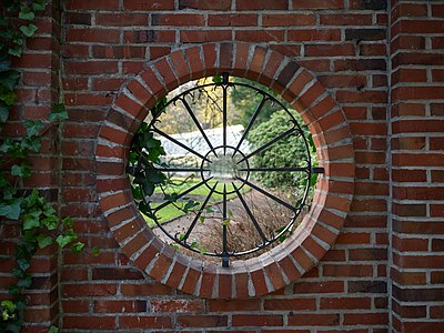 Window at Schlossgarten (palace garden) in Oldenburg. Lower Saxony, Germany