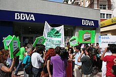 The number of people affected by mortgages they cannot pay led to the emergence in Spain of groups opposed to evictions. The tragedy that evictions meant for many families led the government to paralyze them in 2012. PAH Malaga ante BBVA.jpg