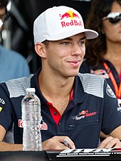 Pierre Gasly (pictured in 2017) was overtaken by Giovinazzi on the final lap of the second race. Pierre Gasly 2017 Malaysia.jpg