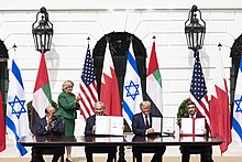 Emirati Minister of Foreign Affairs Abdullah bin Zayed Al Nahyan (furthest right) at the signing of the Abraham Accords. President Trump and The First Lady Participate in an Abraham Accords Signing Ceremony (50346677397).jpg