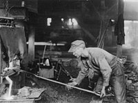 A puddler draining steel from a furnace to create a ball of molten iron, which he will carry to the rolling mill to be fabricated into useful steel items. Puddler.jpg