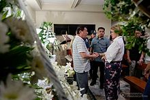 President Rodrigo Duterte condoles with actress Azenith Briones, whose husband was killed in the attack, June 4, 2017 Rodrigo Duterte condoles with families of RWM victims (2017-06-04).jpg