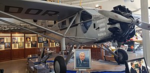 Ryan Brougham in San Diego Air and Space Museum Ryan Brougham with portrait.jpg