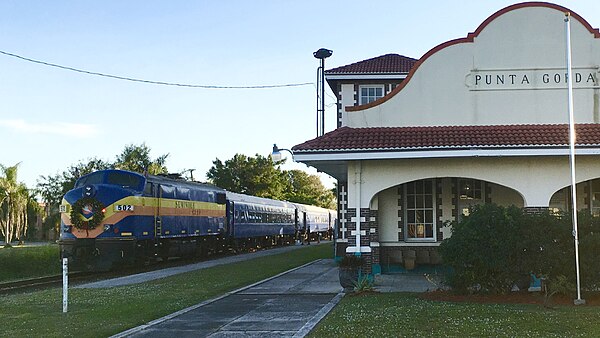 Seminole Gulf's Christmas Rail-Boat at Punta Gorda Depot in 2019