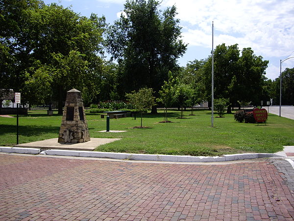 1974 Mennonite Centennial Memorial Monument in Santa Fe Park A threshing stone was cut and placed on 4 sides of this monument. In the foreground is a 