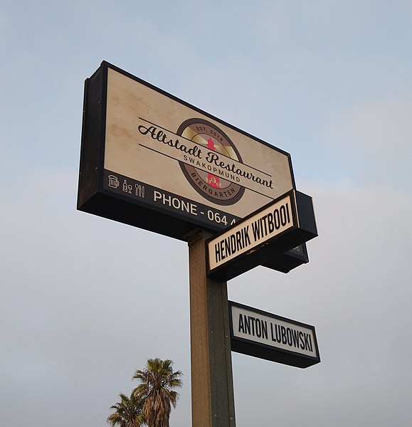 File:Sign Post for Altstadt Restaurant - Biergarten - Hendrik Witbooi - Anton Lubowski - Swakopmund, Namibia.jpg