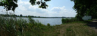 Čeština: Starý houženský rybník u vsi Nové Dvory, okres České Budějovice. English: Starý houženský pond near the village of Nové Dvory, České Budějovice District, South Bohemian Region, Czech Republic.