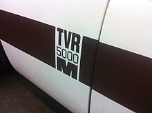 Portion of the side stripe painted by the TVR factory on one of the M-series TVRs shipped to TVR North America Canada. TVR5000M Stripe.JPG