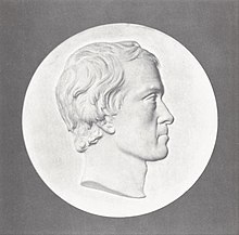 Medallion of Carlyle by Thomas Woolner, 1851. James Caw said that it recalled Lady Eastlake's description of him: "The head of a thinker, the eye of a lover, and the mouth of a peasant." Thomas Carlyle in 1851. Medallion modeled by Thomas Woolner.jpg