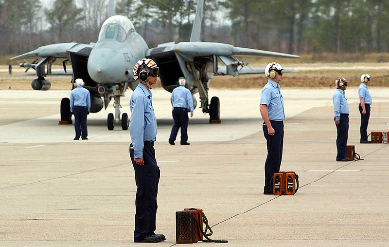 File:US Navy 060310-N-7088F-004 Plane Captains stand ready to direct the incoming F-14 Tomcats returning from completing their final deployment.jpg