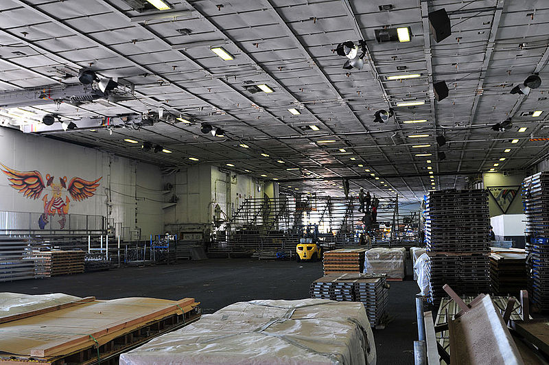 File:US Navy 111108-N-ZI635-177 Civilian contractors erect bleachers as workers construct an alternate basketball arena in the hangar bay aboard Nimitz.jpg