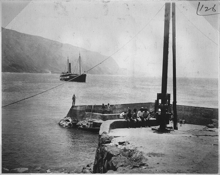 File:View of dock at Leper Settlement looking West. Range light green & white are shwin on this dock when steamer is... - NARA - 296070.jpg